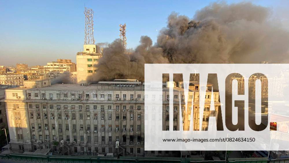 KW28 (250707) -- CAIRO, July 7, 2025 -- Smoke rises from a burning telecommunication building in Cairo, Egypt, on July 7, 2025. A fire broke out on Monday inside the telecommunication building, injuring 14 people, causing a partial disruption of telecommunication and internet services in the Greater Cairo metropolitan area. (Photo by Xinhua) EGYPT-CAIRO-TELECOMMUNICATION BUILDING-FIRE IsmaelxGomaa