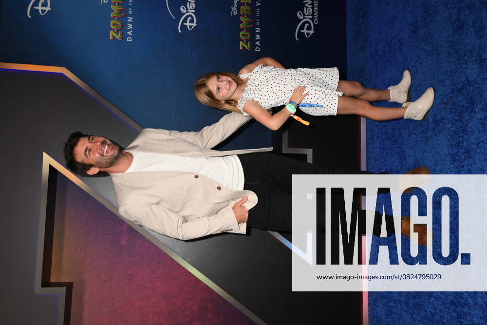 James Wolk and Daughter attends the world premiere of Disney s Zombies 4: Dawn of the Vampires at the El Capitan Theatre in Hollywood, California, on July 8, 2025.