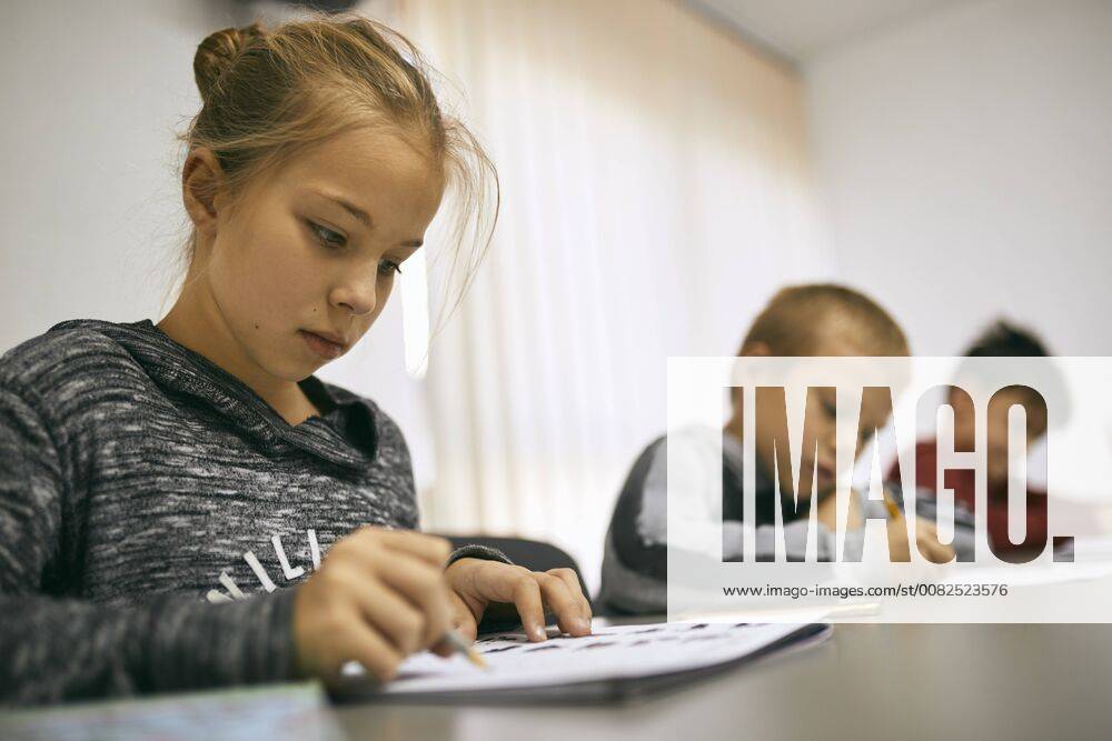 Students learning in class model released Symbolfoto property released ZEDF01212