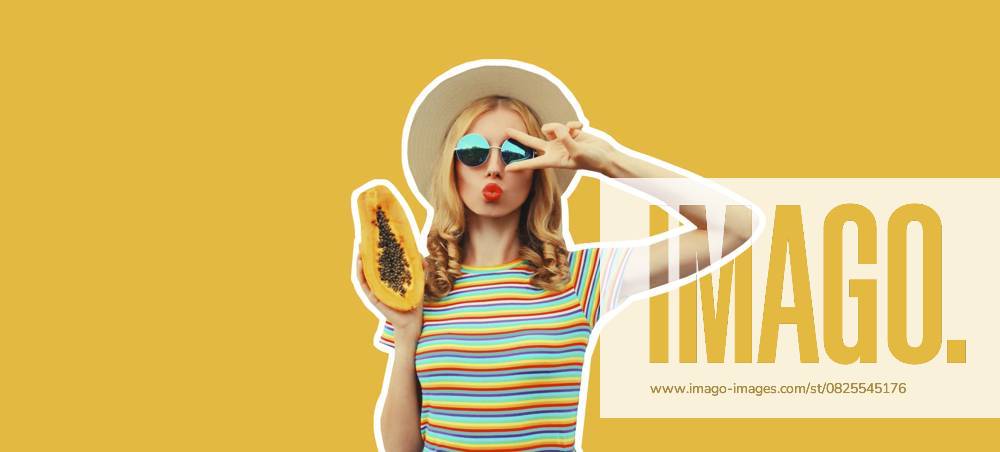 Sommer Porträt der stilvollen jungen Frau mit frischen saftigen Papaya bläst ihre Lippen senden Luft Kuss tragen Strohhut, Sonnenbrille posiert auf gelbem Hintergrund, Magazin Stil Summer portrait of stylish young woman with fresh juicy papaya blowing her lips sending air kiss wearing straw hat, sunglasses posing on yellow background, magazine style