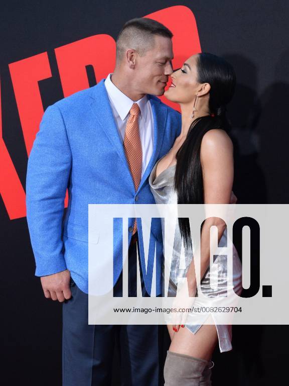 Cast member John Cena (L) and his wife, wrestler Nikki Bella attend the premiere of the motion picture comedy Blockers at the Regency Village Theatre in the Westwood section of Los Angeles on April3, 2018. Storyline: Three parents try to stop their daughters from having sex on Prom night. LAP2018040354 JIMxRUYMEN