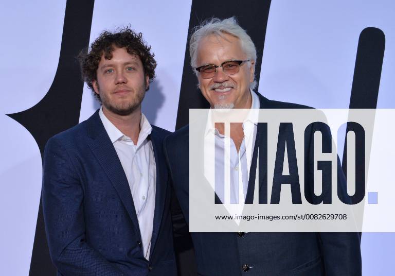 Jack Henry Robbins (L) and Tim Robbins attend the premiere of the motion picture comedy Blockers at the Regency Village Theatre in the Westwood section of Los Angeles on April3, 2018. Storyline: Three parents try to stop their daughters from having sex on Prom night. LAP2018040361 JIMxRUYMEN
