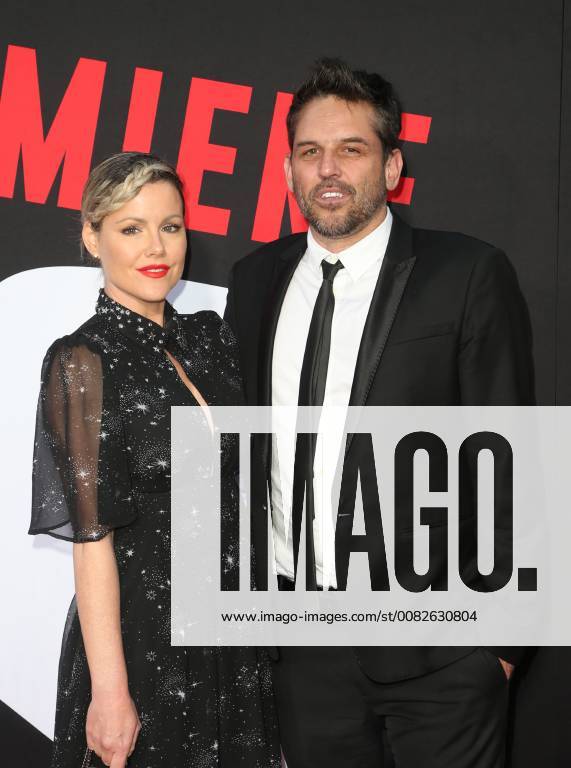 WESTWOOD, CA - APRIL 3: Kathleen Robertson, Chris Cowles, at the Premiere Of Universal Pictures Blockers at the Regency Village Theatre in Westwood, California on April 3, 2018.