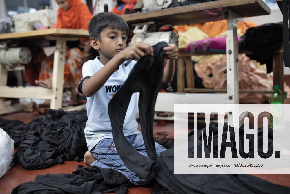 Child labour in Narayanganj, Bangladesh - 19 Jul 2025 An underage worker seen working at a local Ready Made Garment (RMG) factory. In various local factories in Bangladesh, related to Ready Made Garments (RMG) sectors, its often seen that the factory owners hire child labour or underage labour for work so that they can pay less wages. These underage workers work hard but get paid less compared to their adult co-workers due to their age and as they can not get work somewhere else. Large RMG factories, who export goods in different countries, maintain strictly no child labour policy but the local factories still do not maintain any child labour policies. Narayanganj Bangladesh