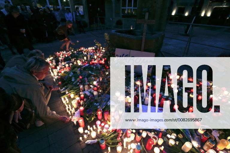 After an ecumenical service on Sunday evening, people set up candles in front of the Kiepenkerl restaurant in Muenster, where a 48-year-old from Muenster had driven a camper into a crowd on Saturday afternoon Two people were killed in the attack and dozens more injured The driver shot himself the act itself See epd report from 08 04 18 sympathy after Amokfahrt in Muenster