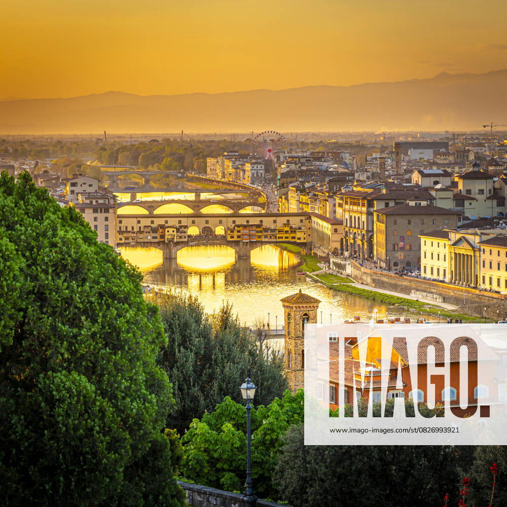 Ponte Vecchio and Arno River at sunset in Florence Tuscany Italy, MHF00856