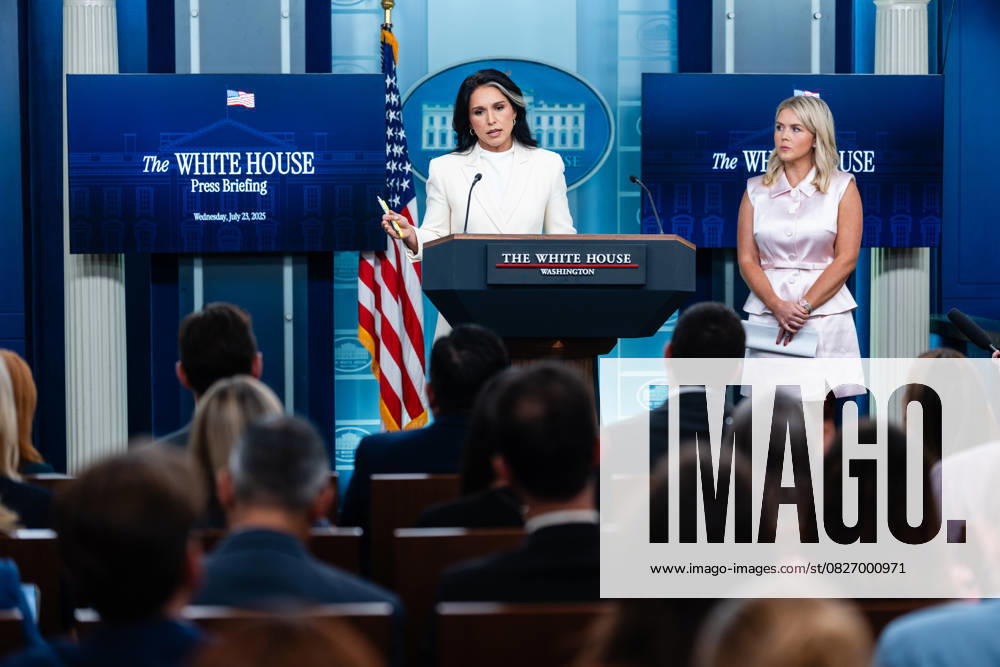 Tulsi Gabbard, Director of National Intelligence (DNI), speaks next to White House Press Secretary Karoline Leavitt, during a news conference in the James S. Brady Press Briefing Room of the White House in Washington, DC, US, on Wednesday, July 23, 2025. Tensions between the Trump administration and the judiciary flared on Tuesday when Attorney General Pam Bondi removed a US attorney for New Jersey that had been named by federal judges to replace the president’s choice.