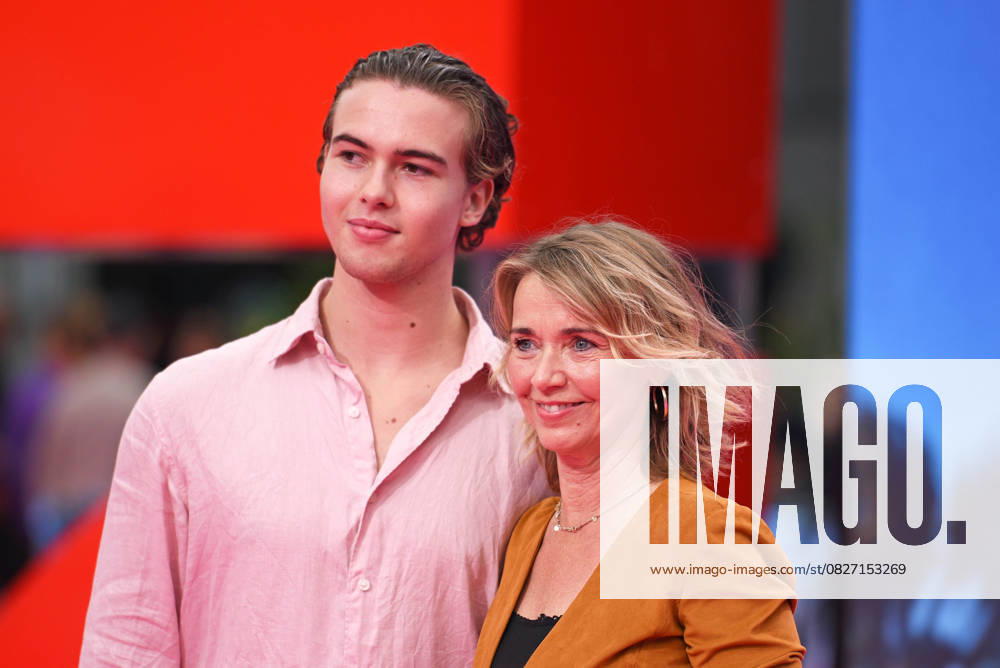 Tina Ruland with son Jahvis Ruland at the German premiere of the movie DIE NACKTE KANONE at the UCI Luxe East Side Gallery in Berlin on 24 07 2025