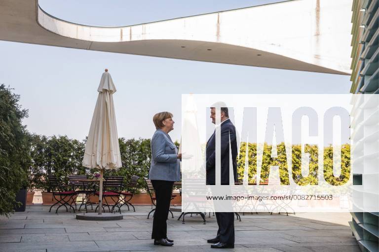 Germany s Chancellor Angela Merkel (L) and Ukraine s President Petro Poroshenko during a meeting. Mikhail Palinchak Press Office of the President of Ukraine TASS TS07B31F