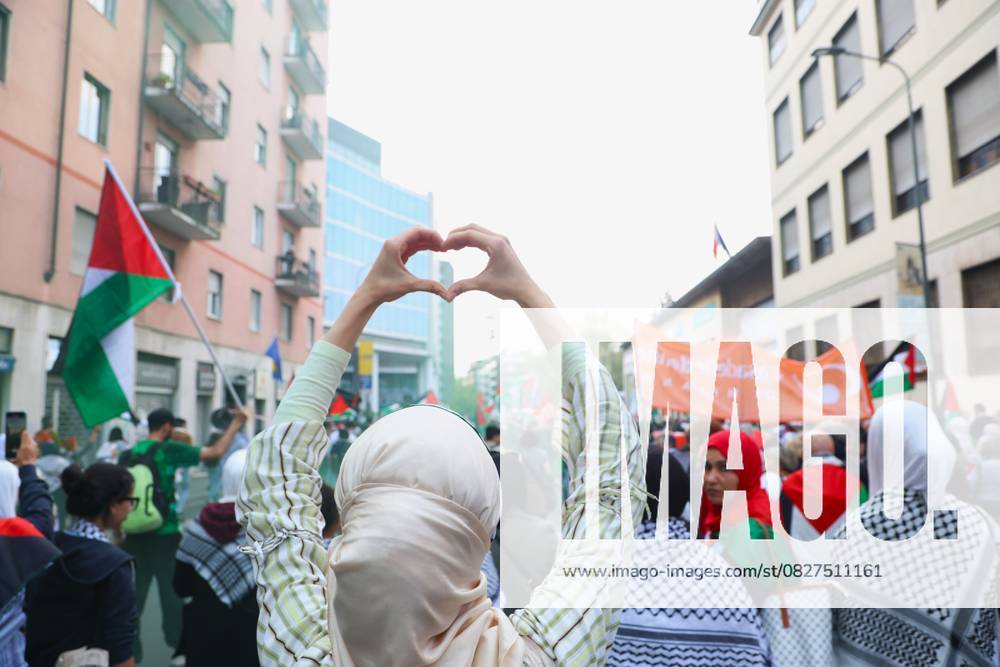 Pro-Palestinian demonstrators march in Italy MILAN, ITALY - APRIL 12: Thousands of demonstrators march at the square while holding Palestinian flags, as they chant for stopping the genocide in Gaza , no displacement of Palestinians and immediate permanent ceasefire , on April 12, 2025 in Milan, Italy. Lombardia Italy. Editorial use only. Please get in touch for any other usage.