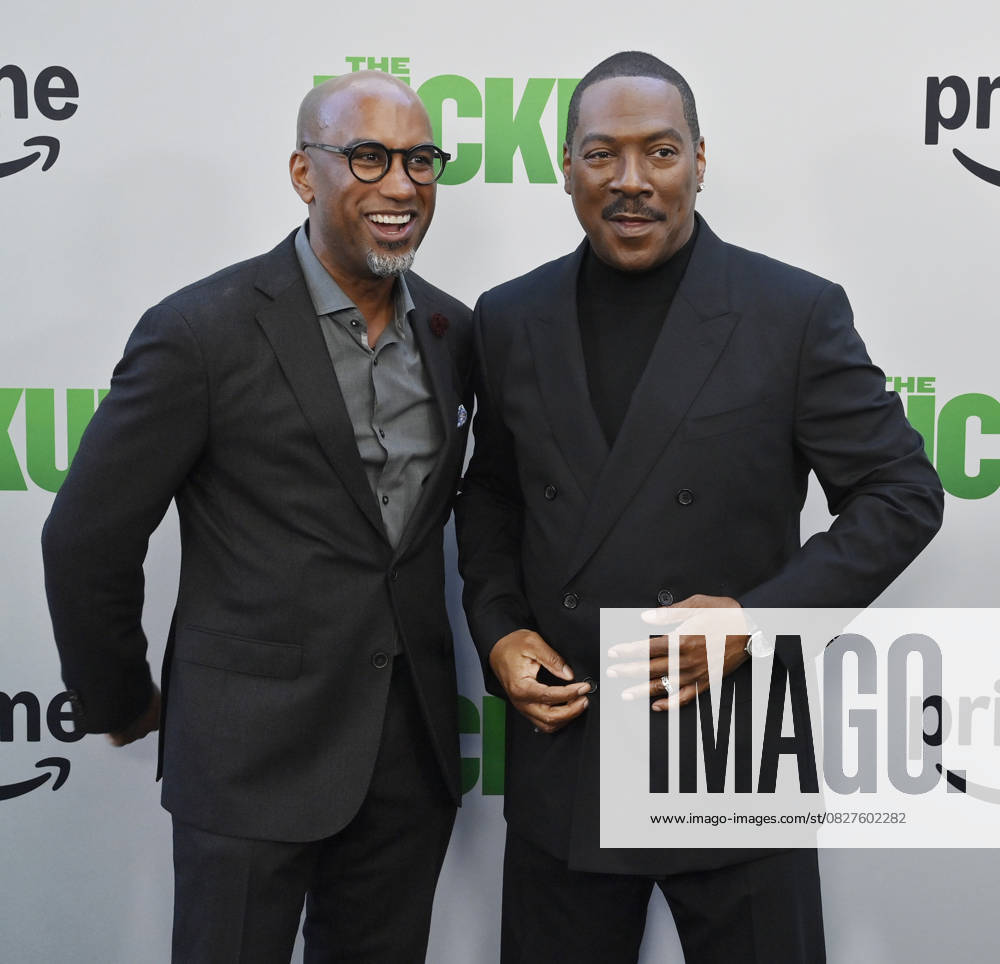 Director Tim Story (L) and cast member Eddie Murphy attend the premiere of the motion picture comedy The Pickup at Regal LA Live in Los Angeles on Sunday, July 27, 2025. Storyline: A routine cash pickup turns into a deadly pursuit when two mismatched armored truck drivers are ambushed by ruthless criminals with plans beyond the cash. LAP2025072744 JIMxRUYMEN
