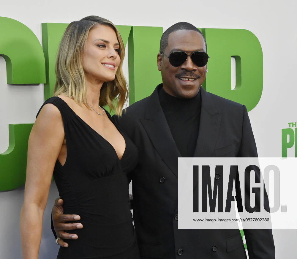 Cast member Eddie Murphy and his wife Paige Butcher attend the premiere of the motion picture comedy The Pickup at Regal LA Live in Los Angeles on Sunday, July 27, 2025. Storyline: A routine cash pickup turns into a deadly pursuit when two mismatched armored truck drivers are ambushed by ruthless criminals with plans beyond the cash. LAP2025072748 JIMxRUYMEN