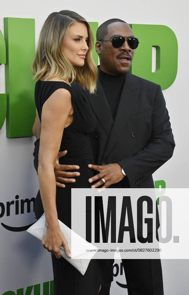 Cast member Eddie Murphy and his wife Paige Butcher attend the premiere of the motion picture comedy The Pickup at Regal LA Live in Los Angeles on Sunday, July 27, 2025. Storyline: A routine cash pickup turns into a deadly pursuit when two mismatched armored truck drivers are ambushed by ruthless criminals with plans beyond the cash. LAP2025072751 JIMxRUYMEN