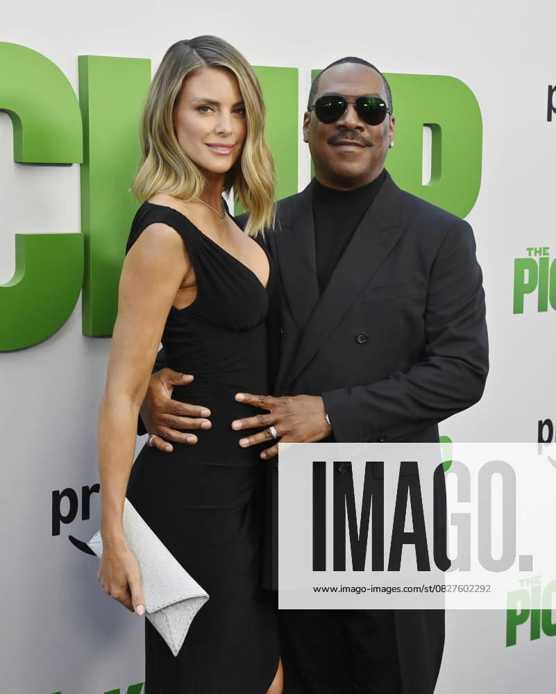 Cast member Eddie Murphy and his wife Paige Butcher attend the premiere of the motion picture comedy The Pickup at Regal LA Live in Los Angeles on Sunday, July 27, 2025. Storyline: A routine cash pickup turns into a deadly pursuit when two mismatched armored truck drivers are ambushed by ruthless criminals with plans beyond the cash. LAP2025072753 JIMxRUYMEN