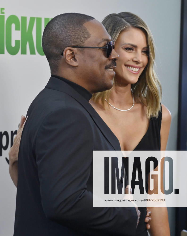 Cast member Eddie Murphy and his wife Paige Butcher attend the premiere of the motion picture comedy The Pickup at Regal LA Live in Los Angeles on Sunday, July 27, 2025. Storyline: A routine cash pickup turns into a deadly pursuit when two mismatched armored truck drivers are ambushed by ruthless criminals with plans beyond the cash. LAP2025072754 JIMxRUYMEN