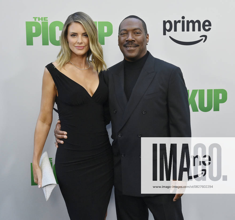 Cast member Eddie Murphy and his wife Paige Butcher attend the premiere of the motion picture comedy The Pickup at Regal LA Live in Los Angeles on Sunday, July 27, 2025. Storyline: A routine cash pickup turns into a deadly pursuit when two mismatched armored truck drivers are ambushed by ruthless criminals with plans beyond the cash. LAP2025072701 JIMxRUYMEN