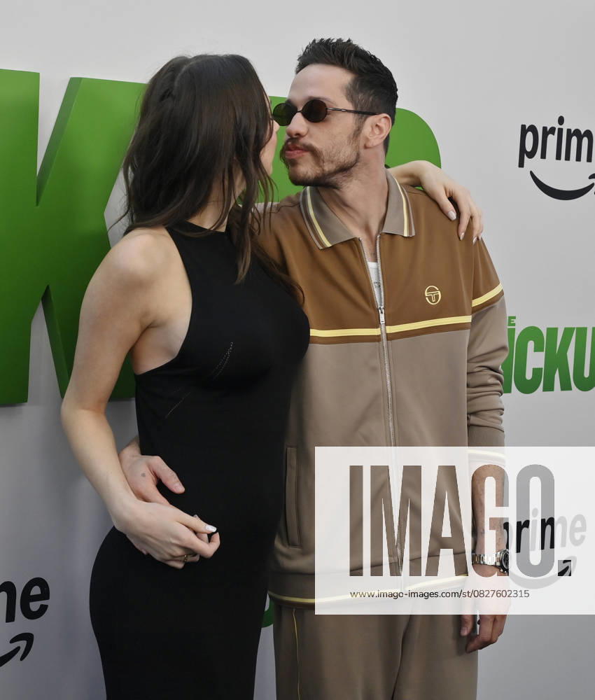 Cast member Pete Davidson (R) and Elsie Hewitt attend the premiere of the motion picture comedy The Pickup at Regal LA Live in Los Angeles on Sunday, July 27, 2025. Storyline: A routine cash pickup turns into a deadly pursuit when two mismatched armored truck drivers are ambushed by ruthless criminals with plans beyond the cash. LAP2025072717 JIMxRUYMEN
