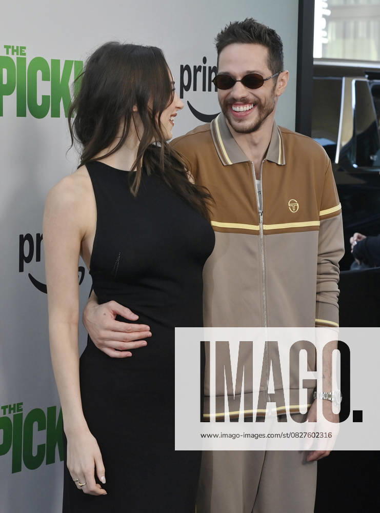 Cast member Pete Davidson (R) and Elsie Hewitt attend the premiere of the motion picture comedy The Pickup at Regal LA Live in Los Angeles on Sunday, July 27, 2025. Storyline: A routine cash pickup turns into a deadly pursuit when two mismatched armored truck drivers are ambushed by ruthless criminals with plans beyond the cash. LAP2025072718 JIMxRUYMEN