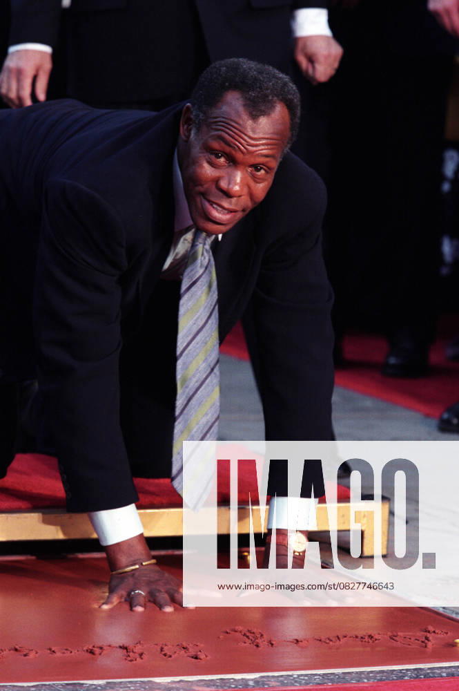 Tom Hanks Hand and Footprint Ceremony Jul 07, 1998; Los Angeles, CA, USA; Actor DANNY GLOVER places his hands in wet cement during a hand and footprint ceremony outside the Chinese Theatre in Los Angeles..