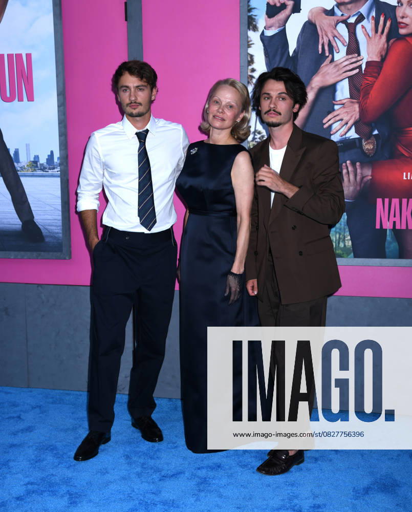 Brandon Thomas Lee, Pamela Anderson, and Dylan Jagger Lee attend the US Premiere of The Naked Gun at SVA Theater in New York. July 28, 2025. New York United States - ZUMAp281 20250728_zea_p281_018