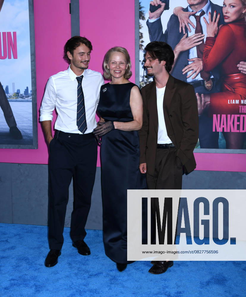 Brandon Thomas Lee, Pamela Anderson, and Dylan Jagger Lee attend the US Premiere of The Naked Gun at SVA Theater in New York. July 28, 2025. New York United States - ZUMAp281 20250728_zea_p281_023