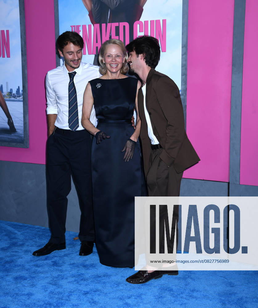Brandon Thomas Lee, Pamela Anderson, and Dylan Jagger Lee attend the US Premiere of The Naked Gun at SVA Theater in New York. July 28, 2025. New York United States - ZUMAp281 20250728_zea_p281_019