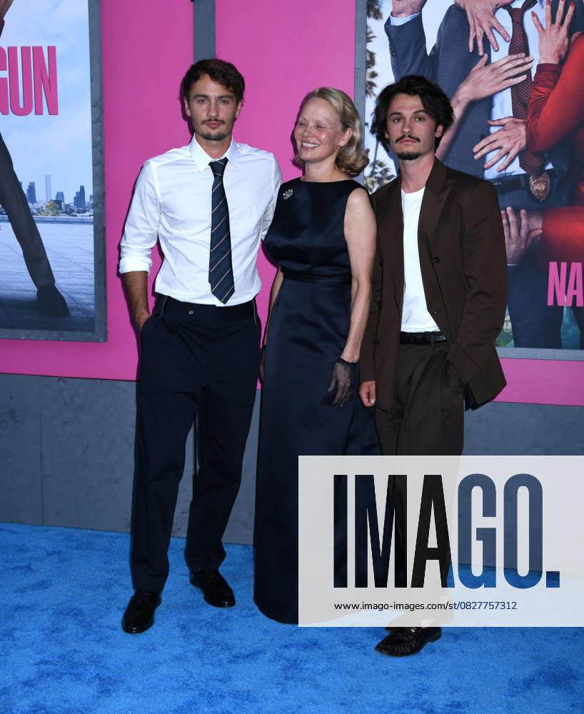 Brandon Thomas Lee, Pamela Anderson, and Dylan Jagger Lee attend the US Premiere of The Naked Gun at SVA Theater in New York. July 28, 2025. New York United States - ZUMAp281 20250728_zea_p281_022