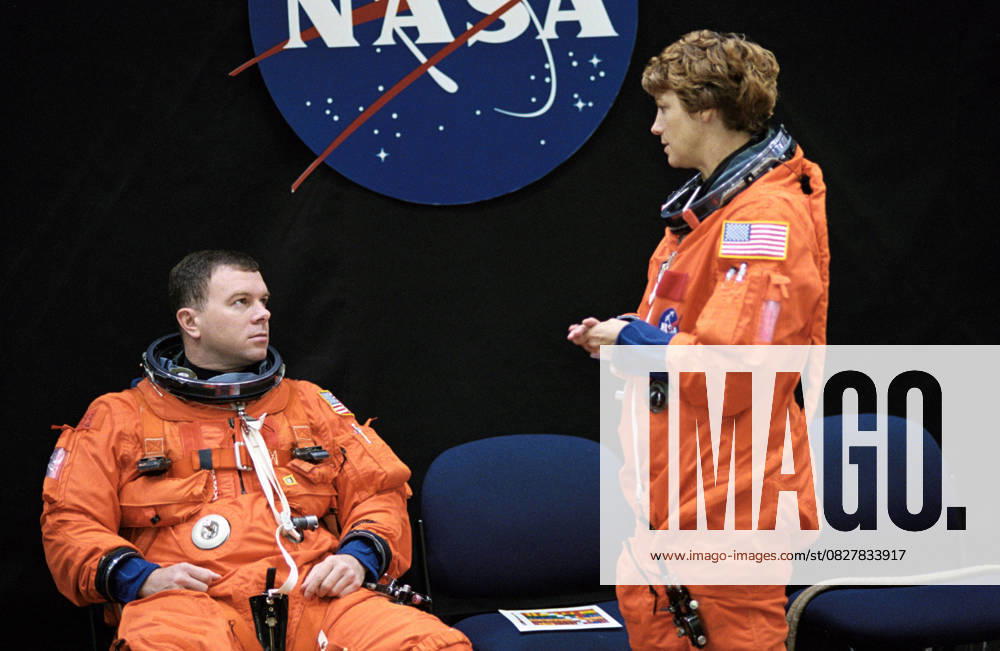 Shuttle Discovery s Launch Delayed Nov 12, 2002; Houston, TX, USA; Astronauts Eileen M. Collins and James M. Kelly, STS-114 mission commander and pilot, respectively, await the start of a training session in the Space Vehicle Mockup Facility at the Johnson Space Center (JSC). Collins and Kelly are wearing training versions of the full-pressure launch and entry suit. Houston TX USA