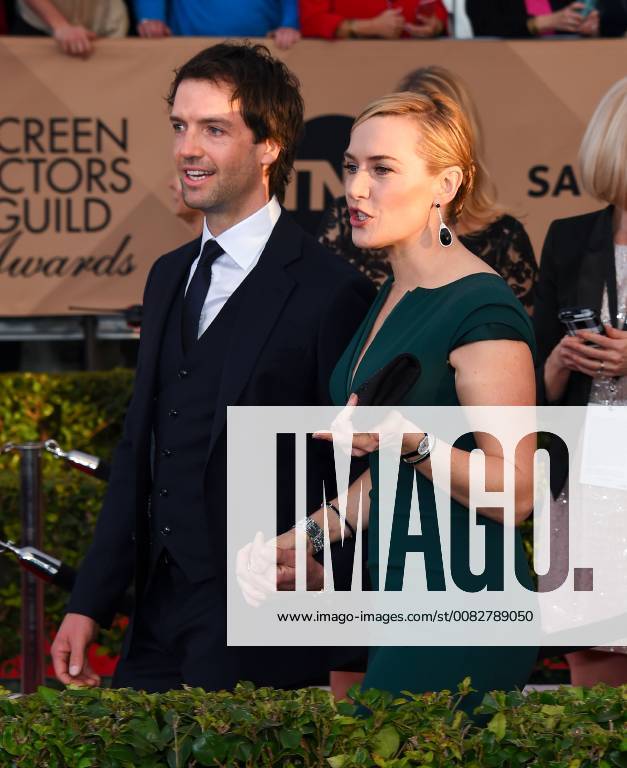 Ned Rocknroll and Kate Winslet arriving at the 22nd Annual Screen Actors Guild Awards in Los Angeles, California - Jan 30, 2016 - Screen Actors Guild Awards 2016, Los Angeles California United States Shrine Auditorium