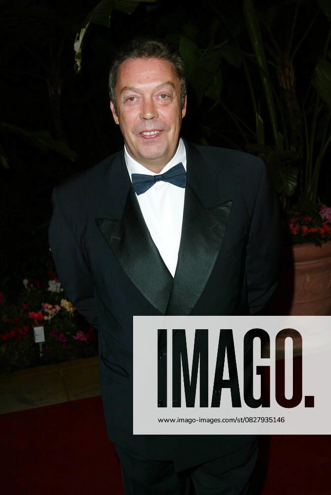 CLIVE DAVIS PARTY Feb. 26, 2002 - Los Angeles, CALIFORNIA - CLIVE DAVIS PRE-GRAMMY PARTY.AT THE BEVERLY HILLS HOTEL LOS ANGELES CA..TIM CURRY. FITZROY BARRETT 2-26-2002 K24194FB (D)