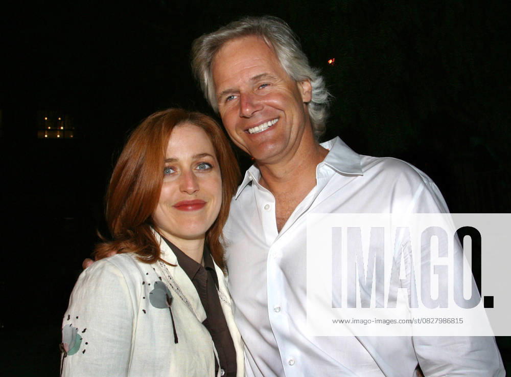 X-Files Series Finale Wrap Party Apr 27, 2002; Hollywood, CA, USA; Actress GILLIAN ANDERSON & Series Creator Exec. Prod. CHRIS CARTER @ the X-Files Series Finale Wrap Party held at the House of Blues..
