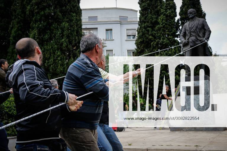 Athens, Greece - Supporters of the Greek Communist party try to pull down a statue of U.S. President Harry S. Truman during a protests against U.S.-led airstrikes in Syria. Police used tear gas to disperse the protesters and the statue was not damaged. Athens Greece - ZUMAe114 20180416_zaa_e114_005
