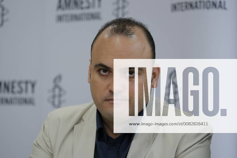 Taher Mokhtar Egyptian doctor and human rights activist - he accepts the Amnesty Human Rights Award for the Nadeem Center Germany Berlin Press Conference Amnesty International Human Rights Situation in Egypt