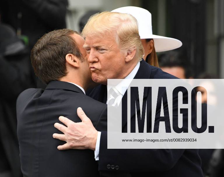 U.S. President Donald Trump greets French President Emmanuel Macron during official welcoming ceremony for the State Visit on the South Lawn of the White House on Tuesday, April 24, 2018. WAS20180424101 PATxBENIC