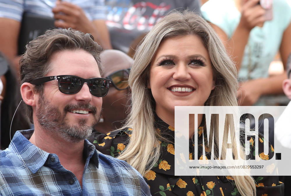 Kelly Clarkson files for divorce from husband Brandon Blackstock. The Voice coach and Blackstock, a music manager, have been married since October 2013 and have two children together, River Rose and Remington Alexander. Blackstock also has two children from a previous marriage. File photo: 22 August 2018 - Hollywood, California - Brandon Blackstock and Kelly Clarkson. Simon Cowell Honored With Star On The Hollywood Walk Of Fame. Photo