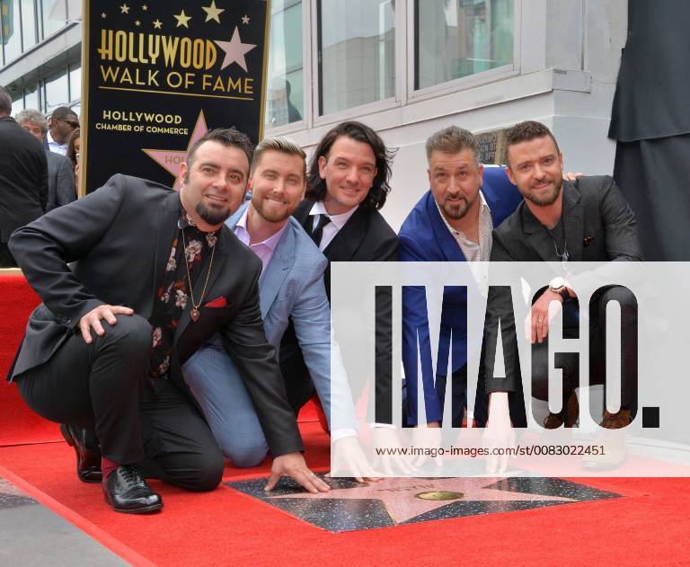 Members of the iconic 90 s boyband *NSYNC Chris Kirkpatrick, Lance Bass, JC Chasez, Joey Fatone and Justin Timberlake (L-R) gather for a photo-op as the band receives the 2,636th star on the Hollywood Walk of fame during an unveiling ceremony in Los Angeles on April 30, 2018. LAP2018043001 JIMxRUYMEN