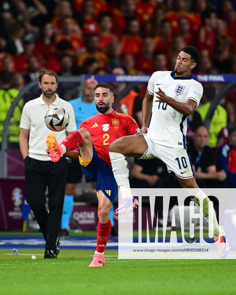 Spain v England: Final - UEFA EURO 2024 BERLIN, GERMANY - JULY 14: Jude Bellingham (10) of England in action against Daniel Carvajal of Spain the UEFA EURO 2024 final match between Spain and England at Olympiastadion in Berlin, Germany on July 14, 2024. Germany World. Editorial use only. Please get in touch for any other usage.