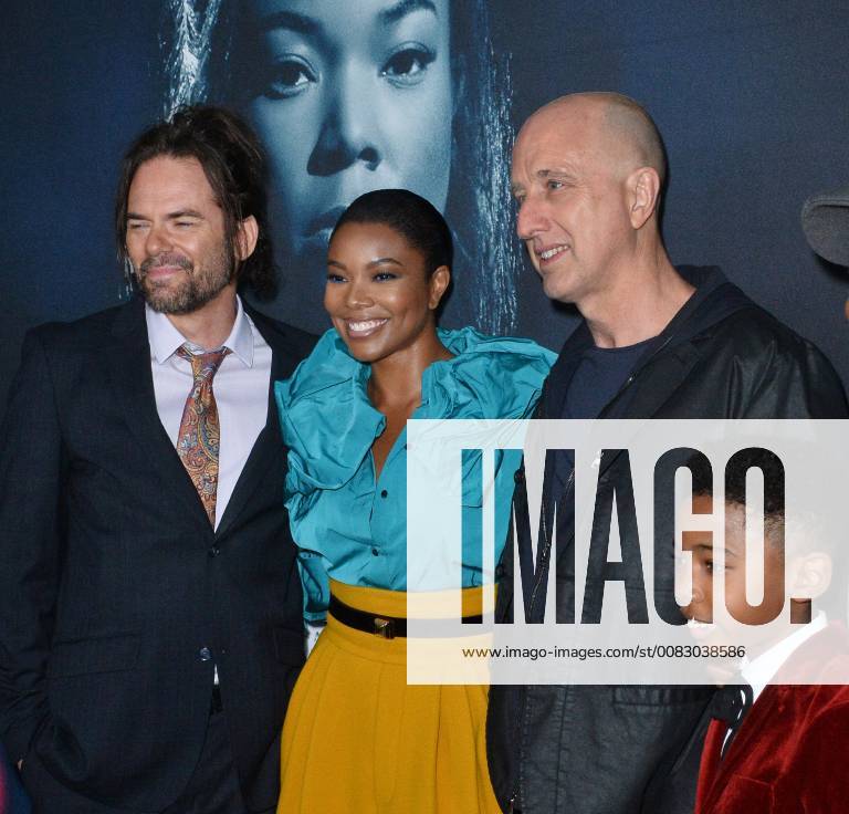 Cast members Billy Burke, Gabrielle Union and Seth Carr (L-R) join director James McTeigue (3rd-L) on the carpet for a photo-op during the special screening of the motion picture thriller Breaking In at the ArcLight Cinema Dome in the Hollywood section of Los Angeles on May 1, 2018. Storyline: A woman fights to protect her family during a home invasion. LAP2018050129 JIMxRUYMEN