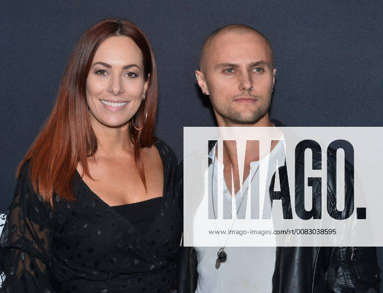 Cast member Mark Furze (R) and Laural Barrett attend the special screening of the motion picture thriller Breaking In at the ArcLight Cinema Dome in the Hollywood section of Los Angeles on May 1, 2018. Storyline: A woman fights to protect her family during a home invasion. LAP2018050140 JIMxRUYMEN
