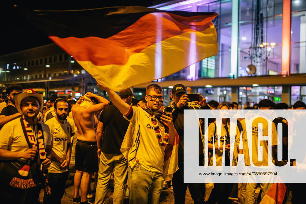 Germany v Denmark: Round of 16 - UEFA EURO 2024 DORTMUND, GERMANY - JUNE 29: Fans of Germany celebrate in front of Dortmund main station after Germany s win in the EURO 2024 round of 16 match between Germany and Denmark on June 29, 2024 in Dortmund, Germany. Germany World. Editorial use only. Please get in touch for any other usage.
