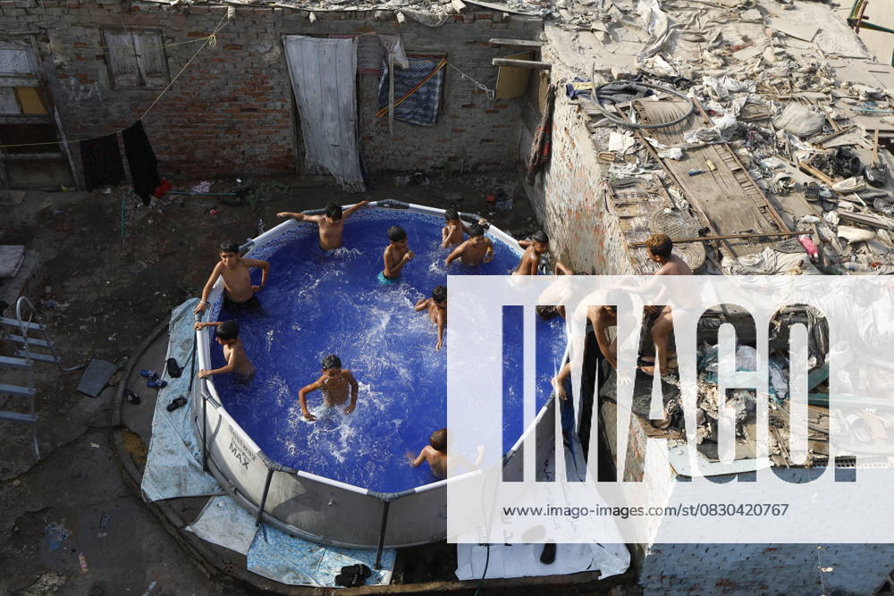 Children swim on rooftops to beat Cairo’s summer heat CAIRO, EGYPT – AUGUST 13: An aerial view of children swimming and playing in an above-ground pool set up on the rooftop of a building during summer in the Eldweka district of Cairo, Egypt on August 13, 2025. Fareed Kotb Anadolu Cairo Egypt. Editorial use only. Please get in touch for any other usage.