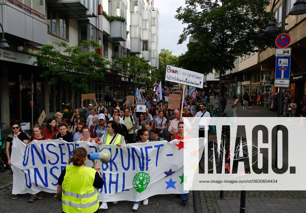 Climate activists hold a demonstration in Cologne. COLOGNE, GERMANY - MAY 31: Demonstrators, gathered at the call of the environmental organization Fridays for Future, march to demand urgent action against climate change ahead of the European Parliament (EU) elections in Cologne, Germany on May 31, 2024. Nordrhein-Westfalen Germany. Editorial use only. Please get in touch for any other usage.