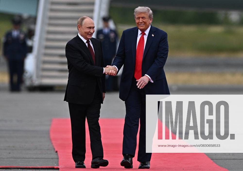 US Russia Summit Arrival 8981945 15.08.2025 U.S. President Donald Trump greets Russian President Vladimir Putin on the tarmac after they arrived to attend a meeting at Joint Base Elmendorf-Richardson in Anchorage, Alaska, the United States. Sergey Bobylev Sputnik Alaska USA