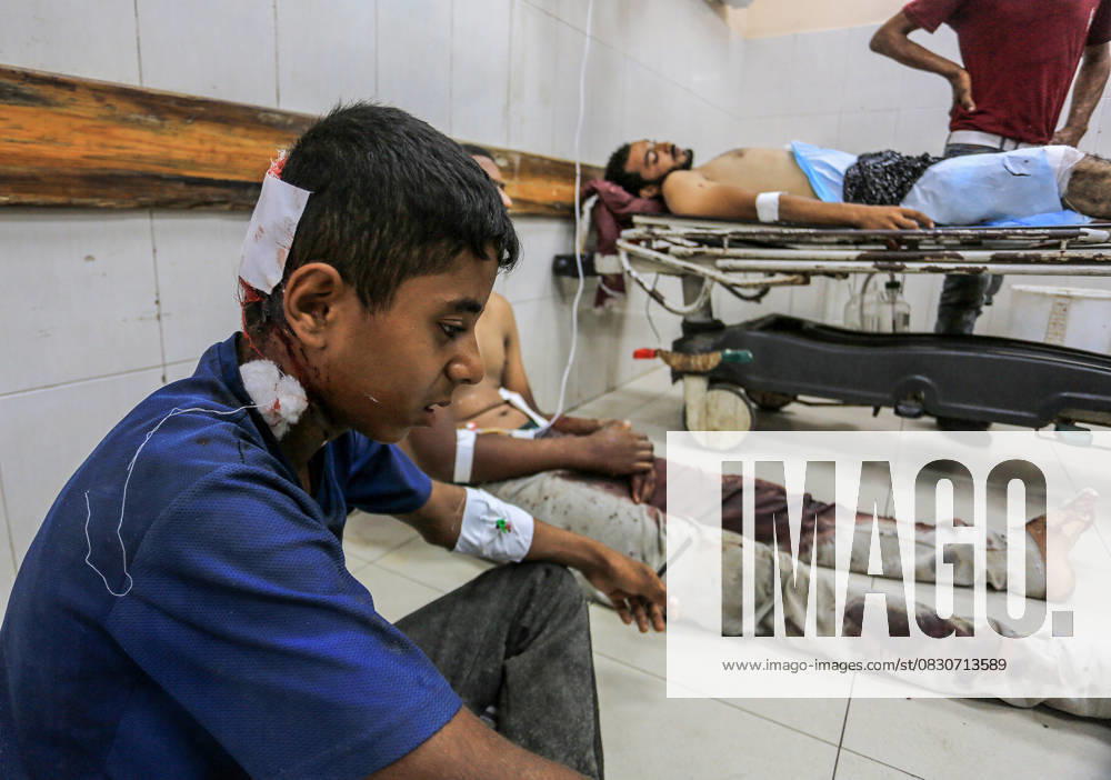 Israeli attacks on Gaza continue RAFAH, GAZA – AUGUST 16: A wounded Palestinian child sits on the floor of Nasser Hospital alongside other injured individuals receiving treatment after Israeli forces opened fire on people waiting for aid in the Al-Tina area of Rafah, in the southern Gaza Strip, on August 16, 2025. Abed Rahim Khatib Anadolu Rafah Gaza. Editorial use only. Please get in touch for any other usage.