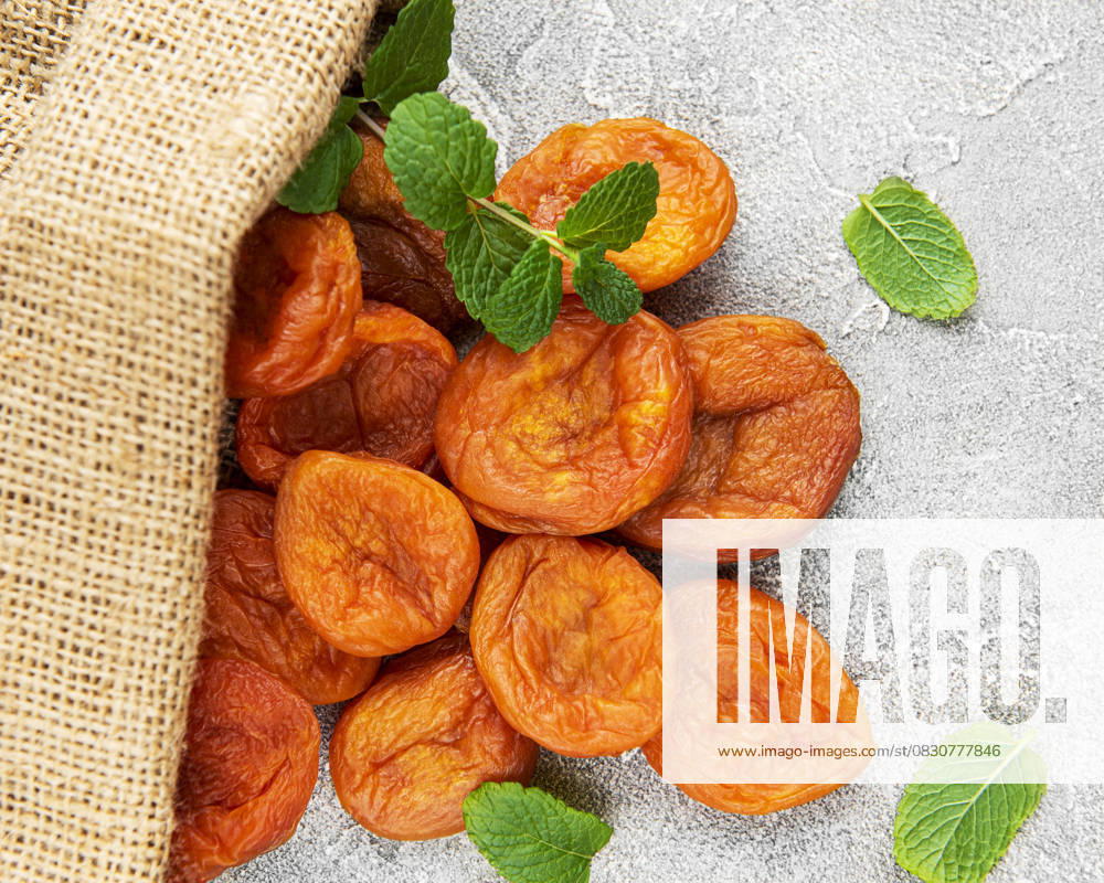 Dried apricots on a grey concrete background Model Released OlenaRudo_ID30936_1049467_092