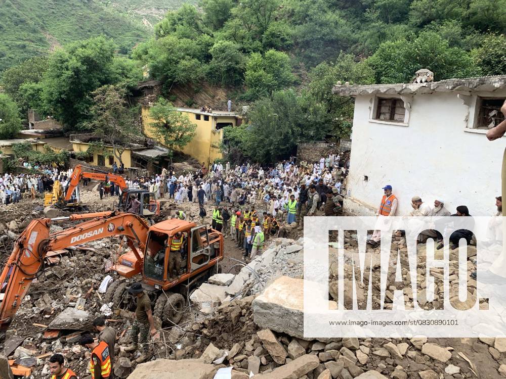(250819) -- SWABI, Aug. 19, 2025 -- Residents watch as relief personnel search through the rubble of collapsed houses for victims during a rescue operation, a day after a cloudburst in Swabi district of northwest Pakistan s Khyber Pakhtunkhwa province on Aug. 19, 2025. A total of 46 people have been killed in monsoon rains during the last 24 hours, raising the death toll of rain-related deaths to 393 in Pakistan since Thursday, the country s National Disaster Management Authority (NDMA) said on Tuesday. In total, 706 Pakistanis have died since the onset of the monsoon season on June 26, the authority said in its latest situation report. (Str Xinhua) (SpotNews) PAKISTAN-SWABI-CLOUDBURST-AFTERMATH AhmadxKamal