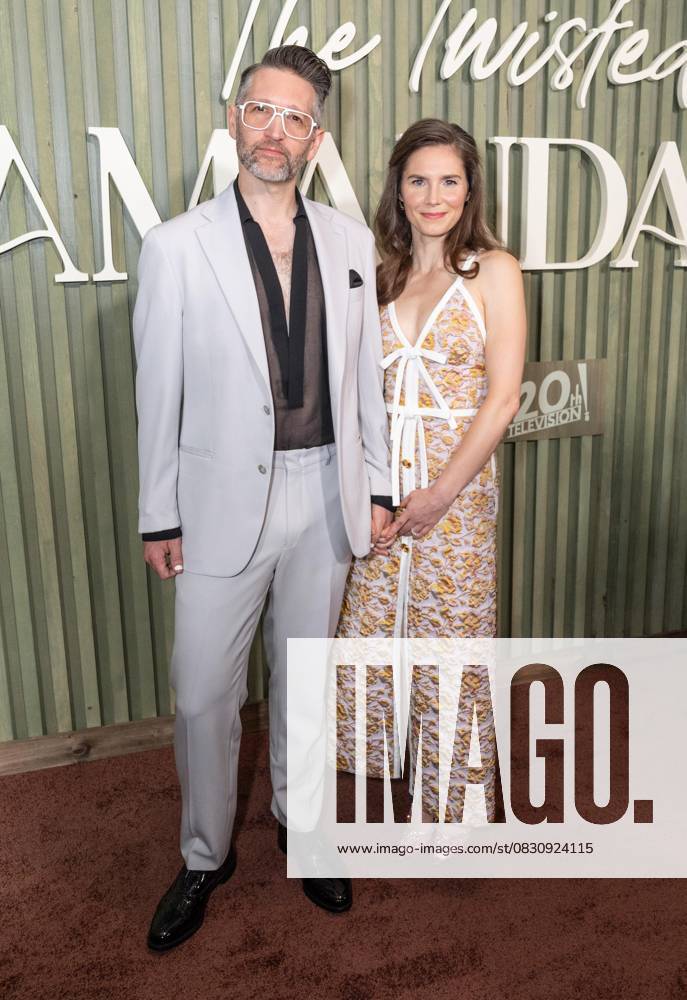 Chris Robinson and Amanda Knox wearing dress by Giambattista Valli attend premiere by HULU of The twisted tail of Amanda Knox at Historical Society in New York, NY on August 19, 2025 Bronx USA - ZUMAr339 20250819_znp_r339_031