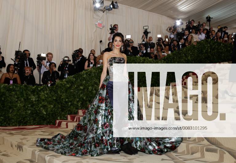 Amal Clooney arrives on the red carpet at The Metropolitan Museum of Art s Costume Institute Benefit Heavenly Bodies: Fashion and the Catholic Imagination at Metropolitan Museum of Art in New York City on May 7, 2018. NYP20180507211 JOHNxANGELILLO