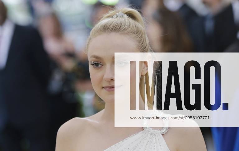 Dakota Fanning arrives on the red carpet at The Metropolitan Museum of Art s Costume Institute Benefit Heavenly Bodies: Fashion and the Catholic Imagination at Metropolitan Museum of Art in New York City on May 7, 2018. NYP20180507812 JOHNxANGELILLO