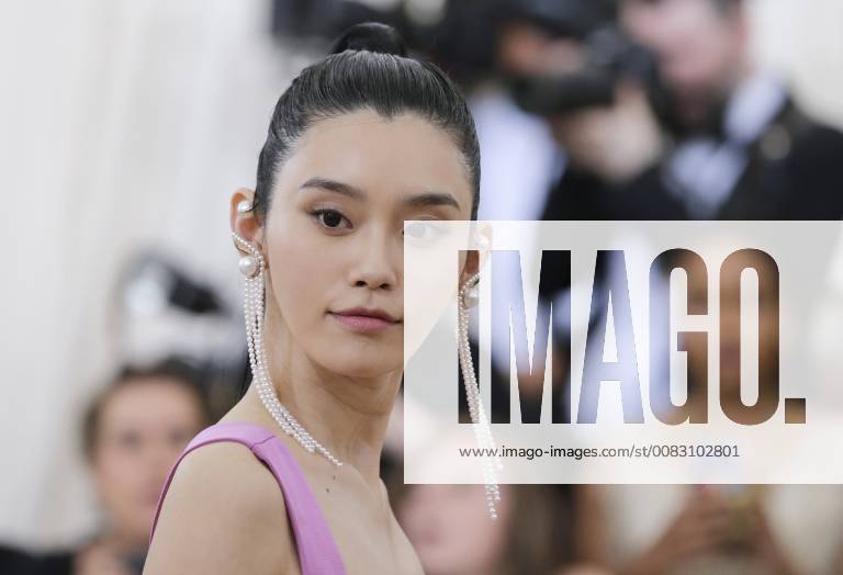 Ming Xi arrives on the red carpet at The Metropolitan Museum of Art s Costume Institute Benefit Heavenly Bodies: Fashion and the Catholic Imagination at Metropolitan Museum of Art in New York City on May 7, 2018. NYP20180507807 JOHNxANGELILLO